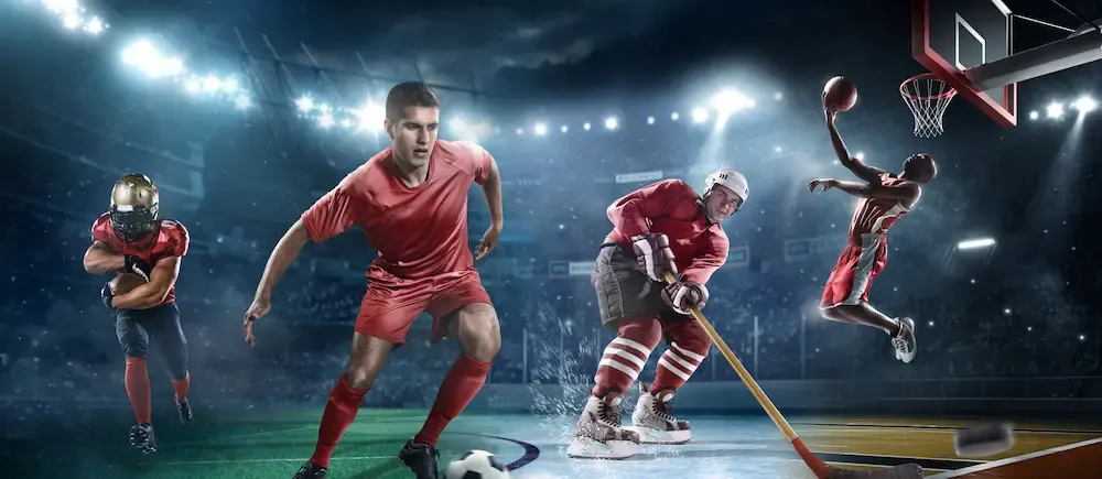 Sports action shot of hockey, basketball and soccer players.